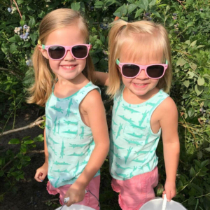 Two girls with sunglasses on