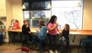 People eating ice cream inside the shop